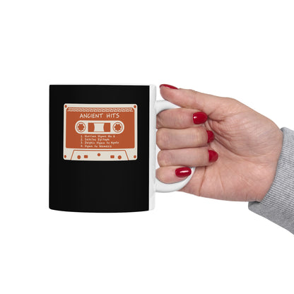 Ancient Hits Cassette ceramic mug, 15oz, held in hand