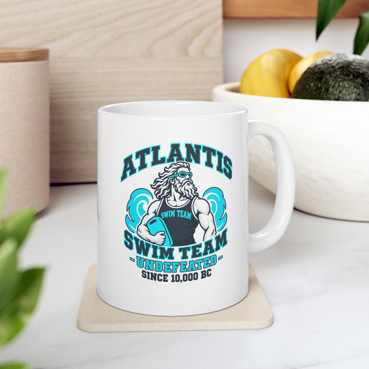 Atlantis Swim Team ceramic mug, 11oz, on a kitchen counter