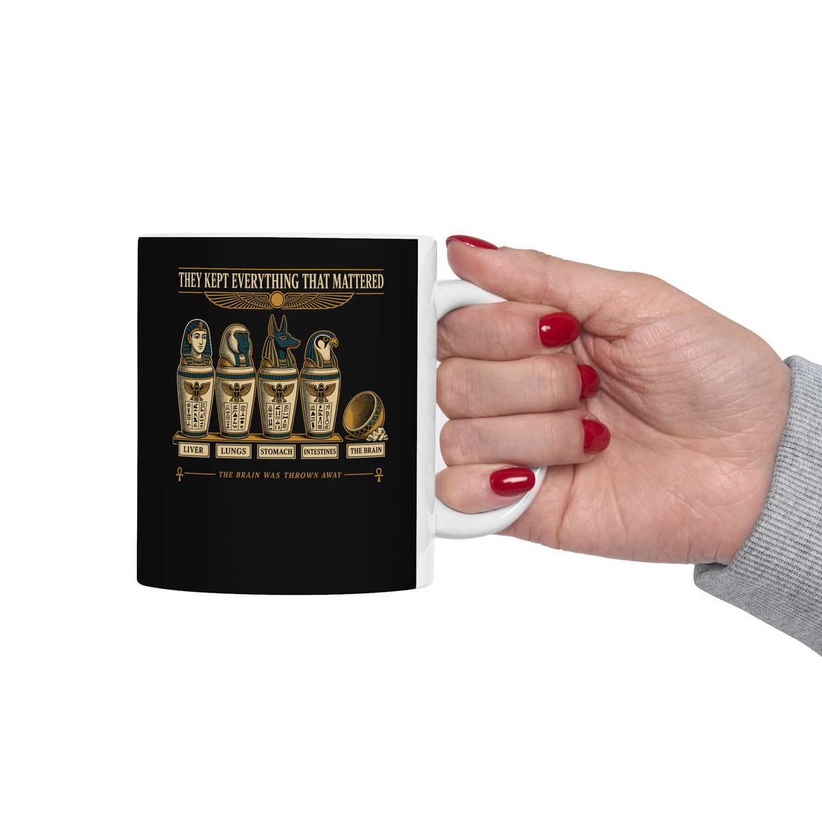 Egyptians Threw Brain Away ceramic mug, 15oz, held in hand