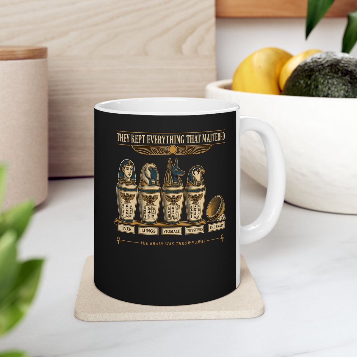 Egyptians Threw Brain Away ceramic mug, 11oz, on a kitchen counter
