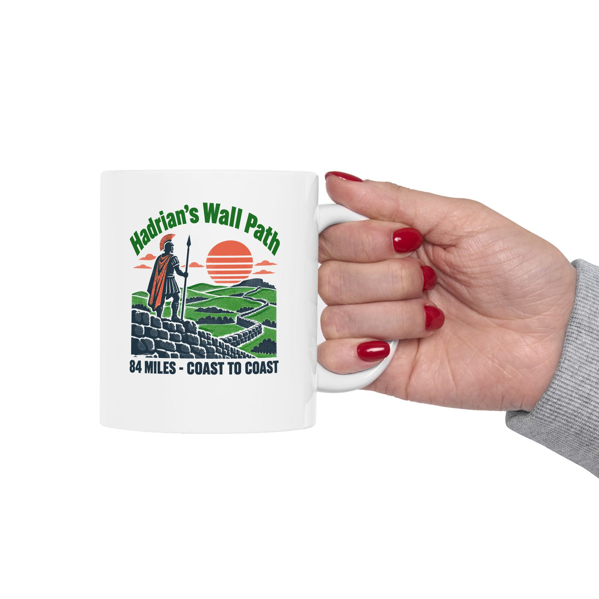 Hadrian's Wall Path Coast to Coast ceramic mug, 15oz, held in hand