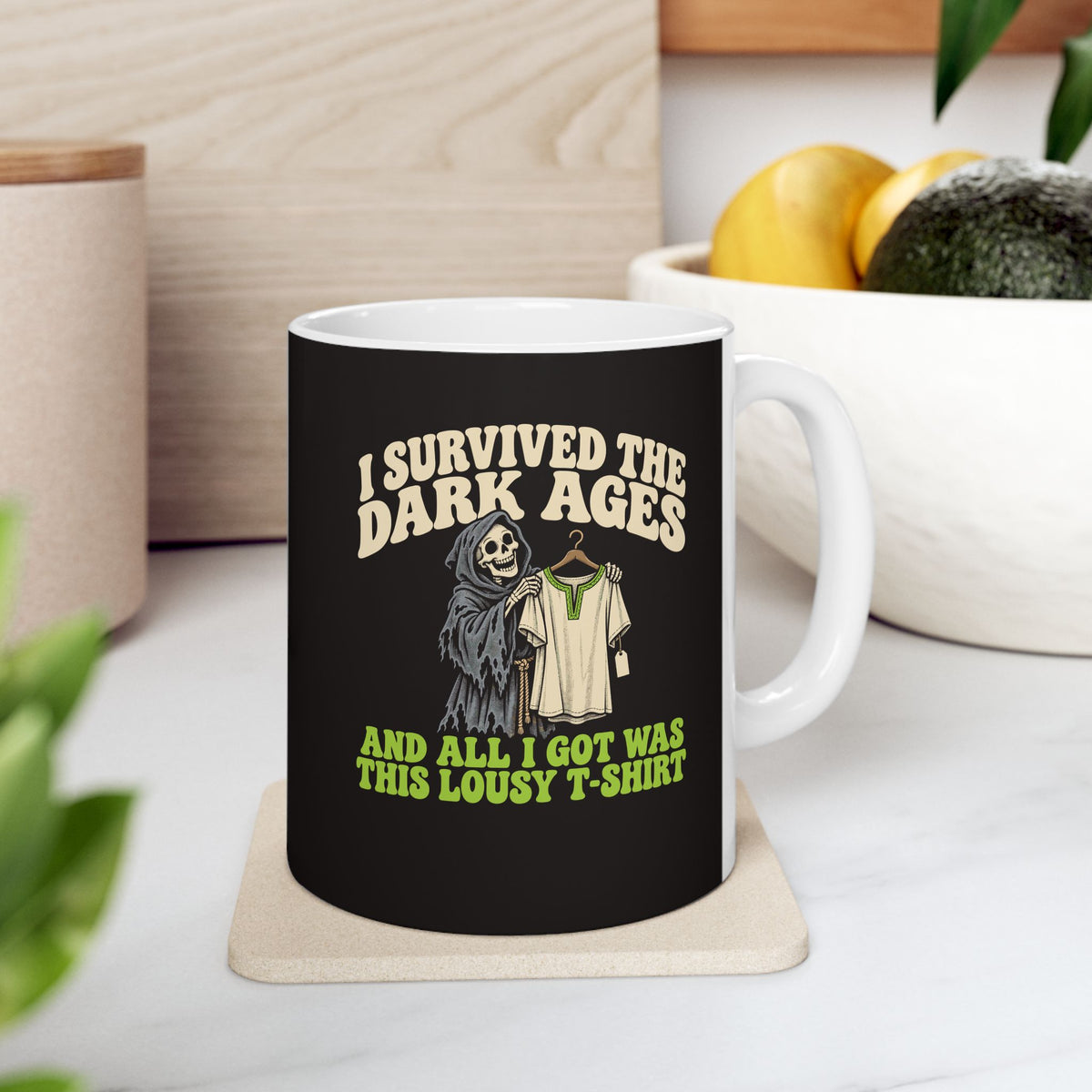 I Survived the Dark Ages Lousy T-Shirt ceramic mug, 11oz, on a kitchen counter