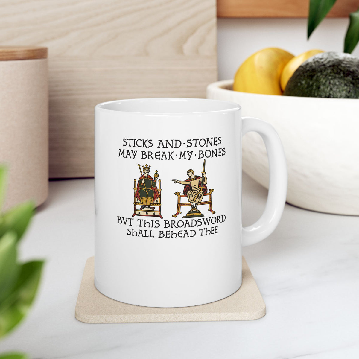 Sticks and Stones Medieval Tapestry ceramic mug, 11oz, on a kitchen counter