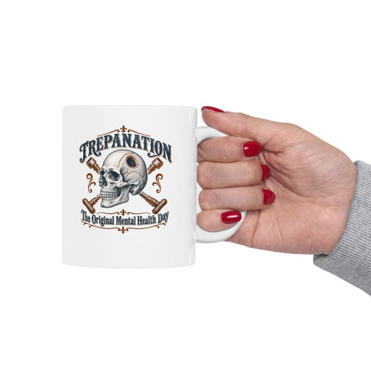 Trepanation The Original Mental Health Day ceramic mug, 15oz, held in hand